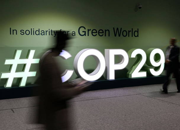 World agrees to climate deal on financial aid for developing countries after summit nearly implodes