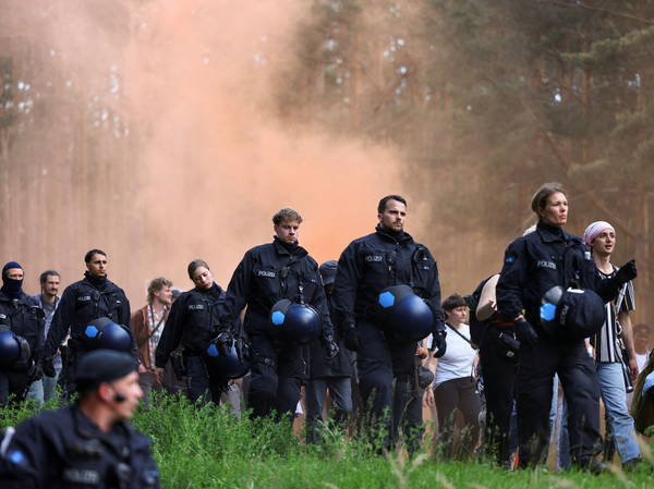 German police break up an environmental activists’ camp near Tesla plant outside Berlin