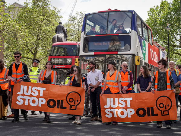 Just Stop Oil supporters paint US embassy orange after Trump declares victory