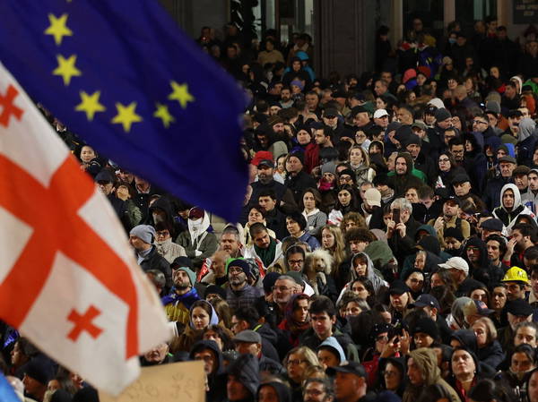 Georgia election chief doused in paint as protests continue after divisive parliamentary vote