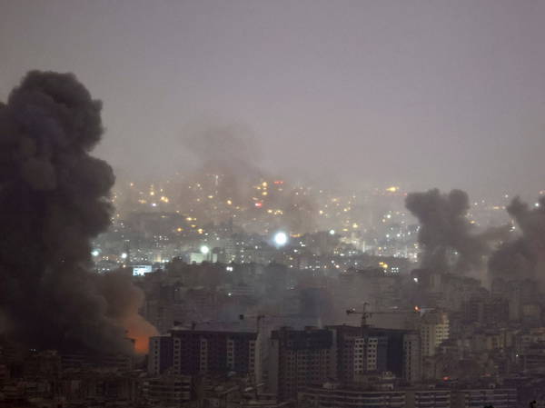 Israel bombards Beirut suburbs as its leadership prepares to vote on ceasefire with Hezbollah