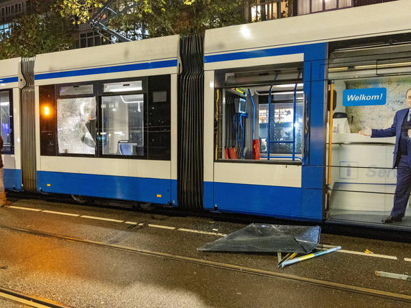 Amsterdam police warn of fresh calls for unrest a day after rioters torch a tram