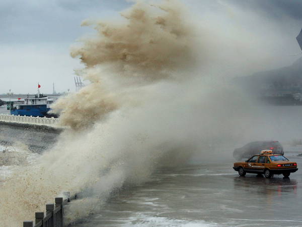 Strong typhoon prompts more evacuations in Philippines, the fifth major storm to hit in three weeks