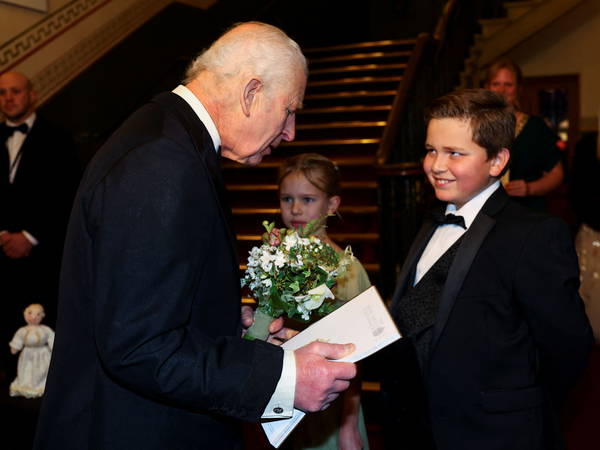 King attends Royal Variety Performance alone after Queen pulls out