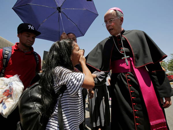 As US Catholic bishops meet, Trump looms over their work on abortion and immigration