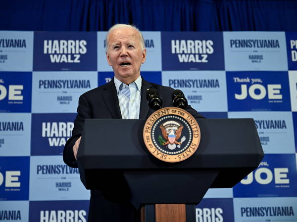 Biden suggests he'd like to smack 'macho guys' during final campaign stop