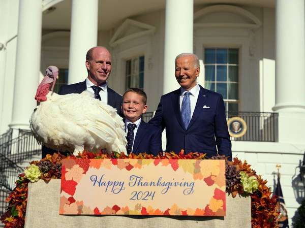 Biden pardons turkeys Peach and Blossom for his last White House Thanksgiving