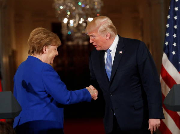 German ex-leader Merkel says she felt sorrow at Trump’s comeback and recalls awkward non-handshake