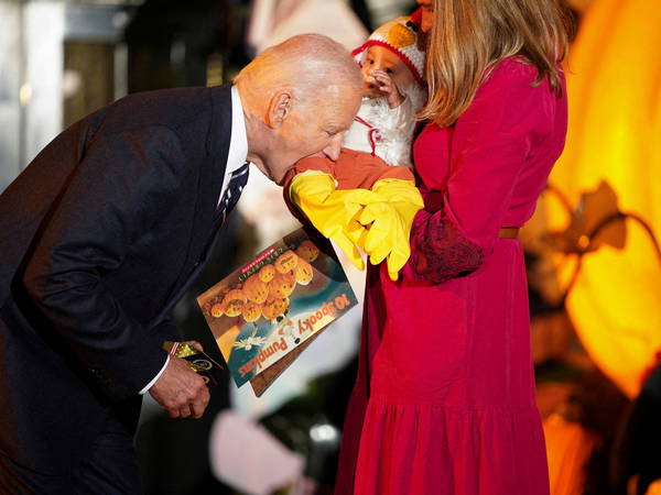 Biden, 81, bites baby dressed as chicken during WH Halloween event