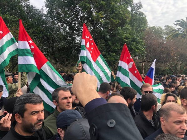 Police and protesters clash in Georgia’s separatist Abkhazia region over pro-Moscow property measure