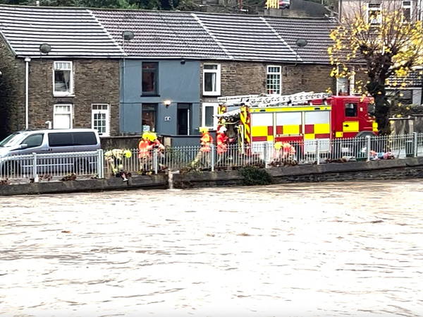 Storm Bert: Father rescues son from sinking car as floods wreak havoc