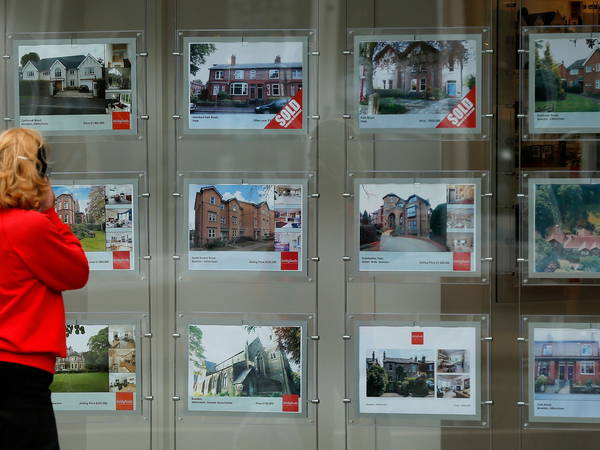 UK house prices surprise with fastest rise for two years, says Nationwide