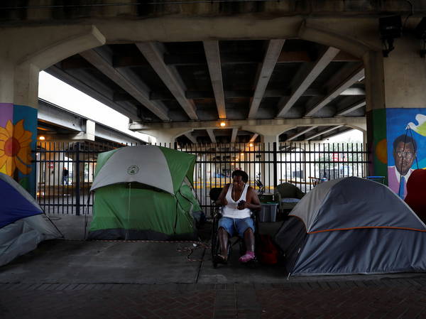 Before Taylor Swift show in New Orleans, a homeless encampment is forced to move