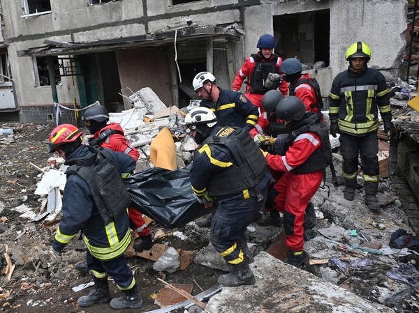 Russian bomb hits building in Ukraine’s 2nd largest city, killing 3, including 2 teens