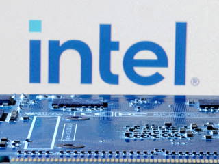 Intel reports third-quarter loss but forecasts Q4 revenue above estimates, shares surge