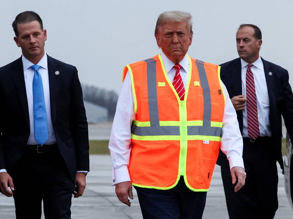 Trump rides in garbage truck in effort to seize on Biden comment