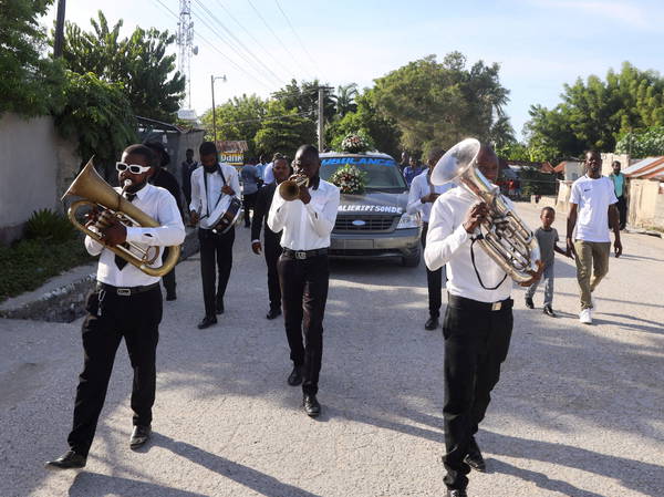 Another town in Haiti comes under attack a week after gangs killed at least 115 people